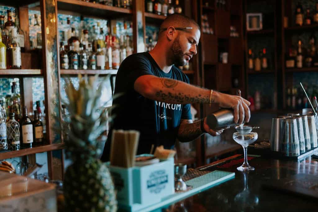 Bartender makes a rum drink at Lovango Rum Bar, St. John, USVI