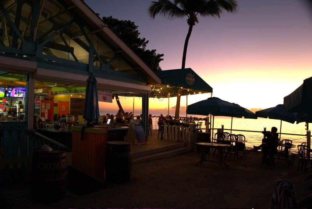 The sun begins to set at the waterfront Rhythms at Rainbow Beach in Frederiksted on St. Croix in the U.S. Virgin Islands.
