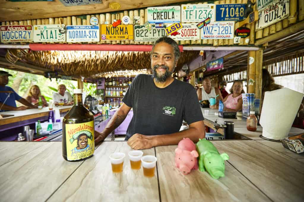 Bartender at the open-air Mt. Pellier Domino Club on St. Croix, U.S. Virgin Islands